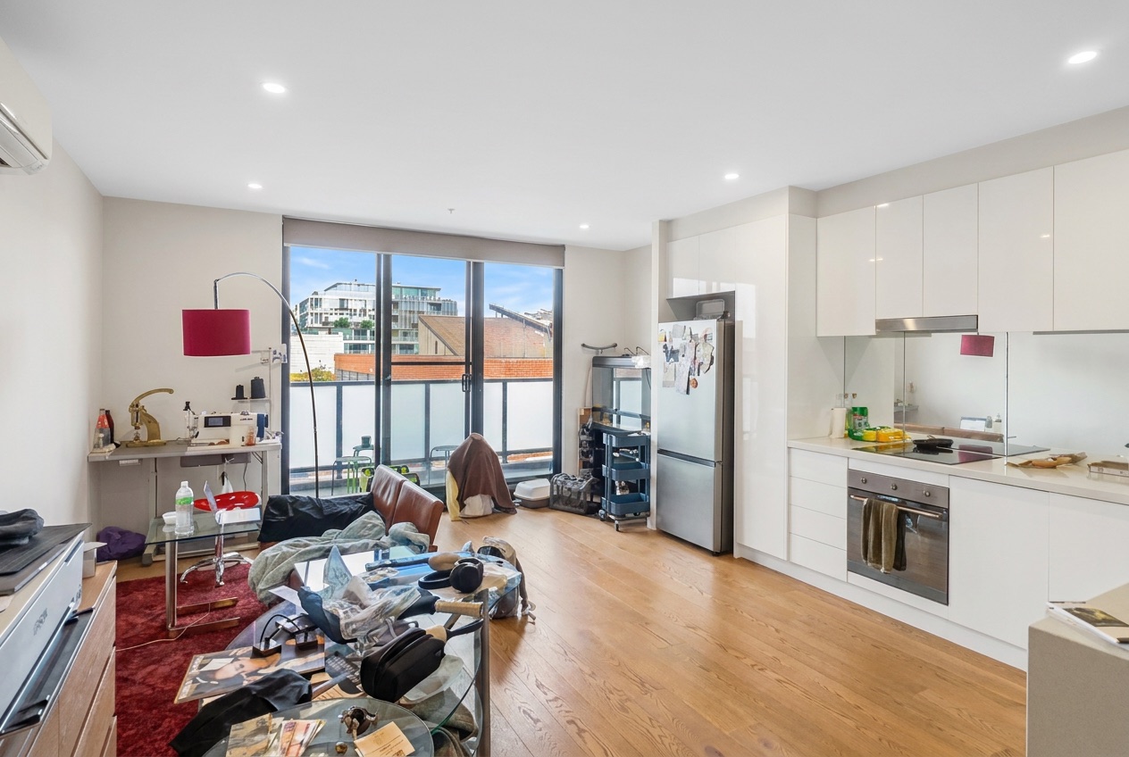 The same living room after the ProMyPhoto finish — window view pulled through, corrected colour and light