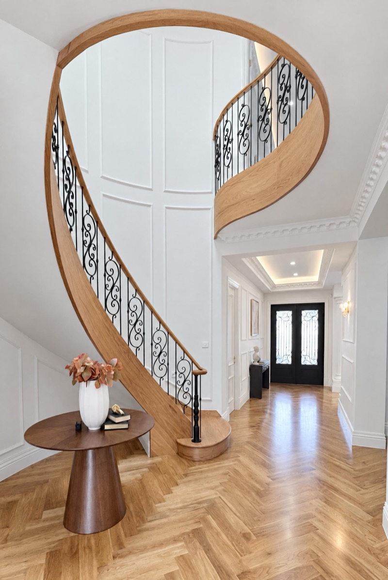 The three captured frames merged into one finished staircase hall photo